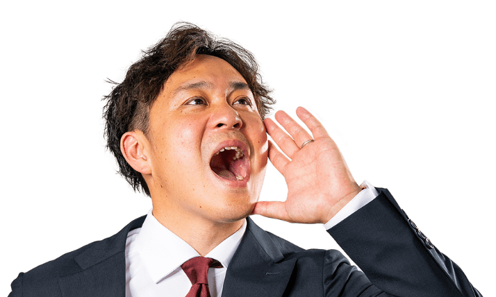 遠くに叫んでいる様子のスーツの男性